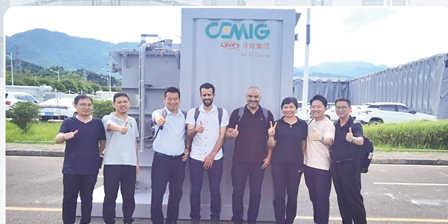 Tianyu and CEMIG project teams beside a prefabricated substation in Brazil